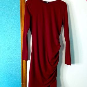 Never worn. Burgundy ruched dress. Size small